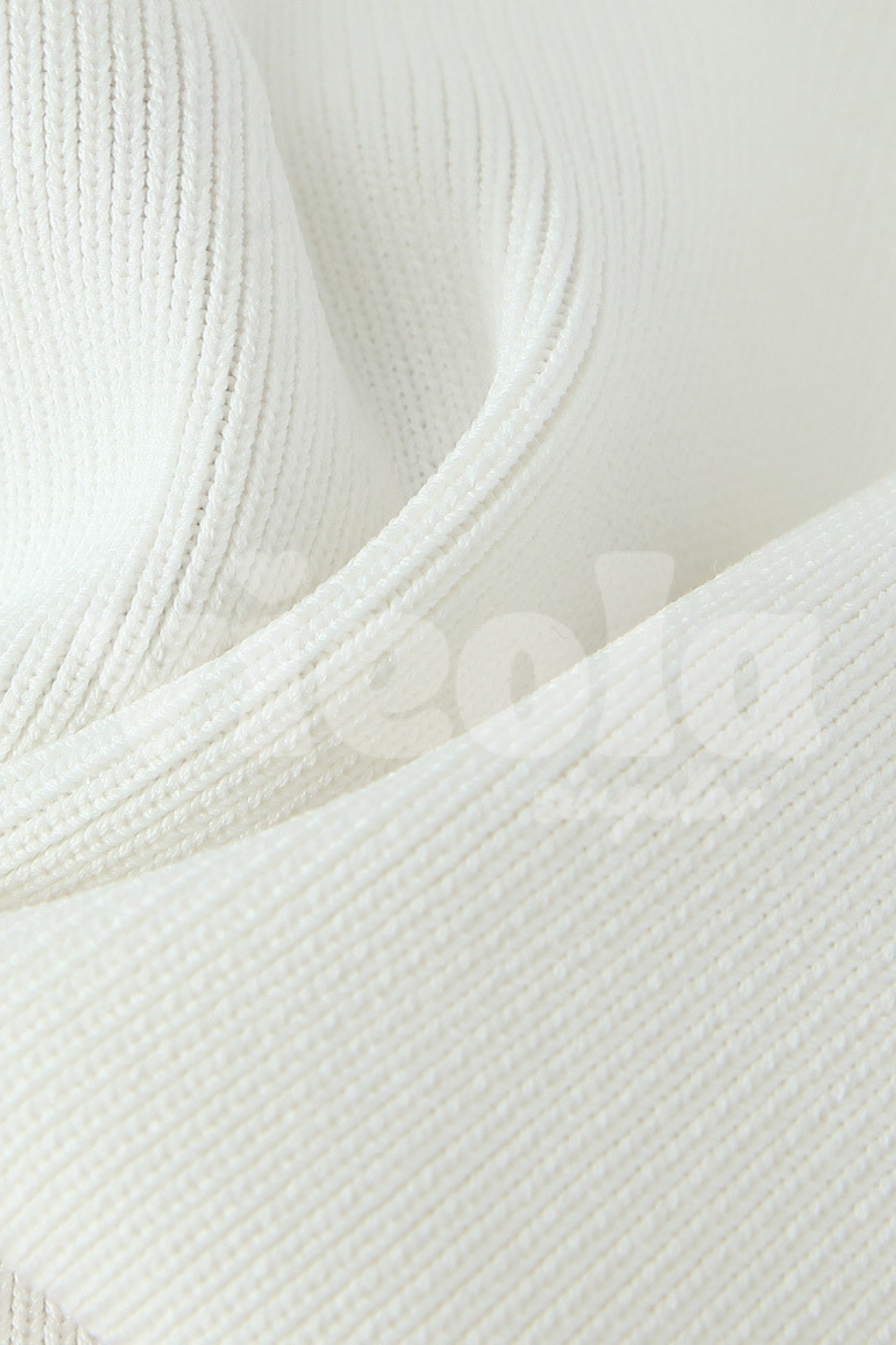 Close-up of textured white fabric