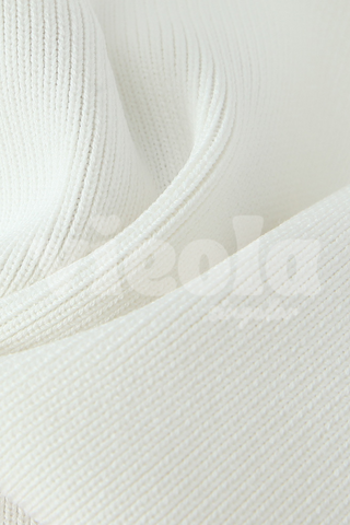 Close-up of textured white fabric
